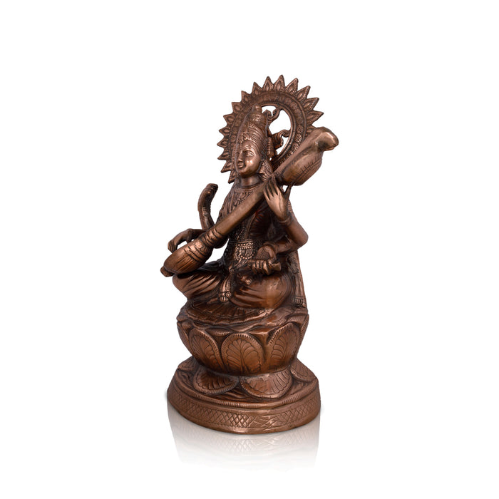 Saraswati Devi Sitting On Lotus Base - 24 x 14 Inches | Copper Oxidised Idol/ Saraswathi Statue For Temple Decor